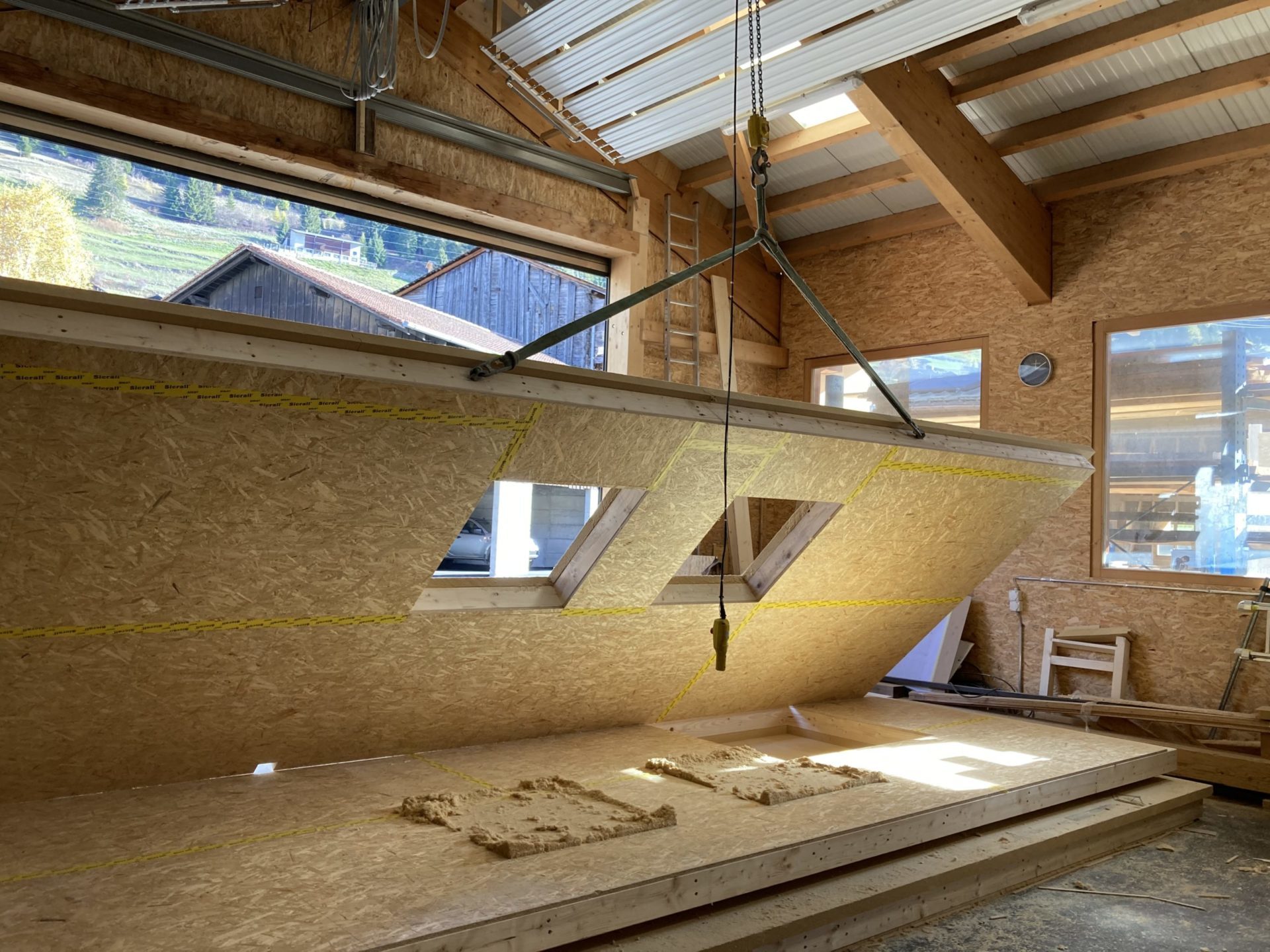 Montage d'élément de maison à ossature bois en atelier – Maison d'habitation